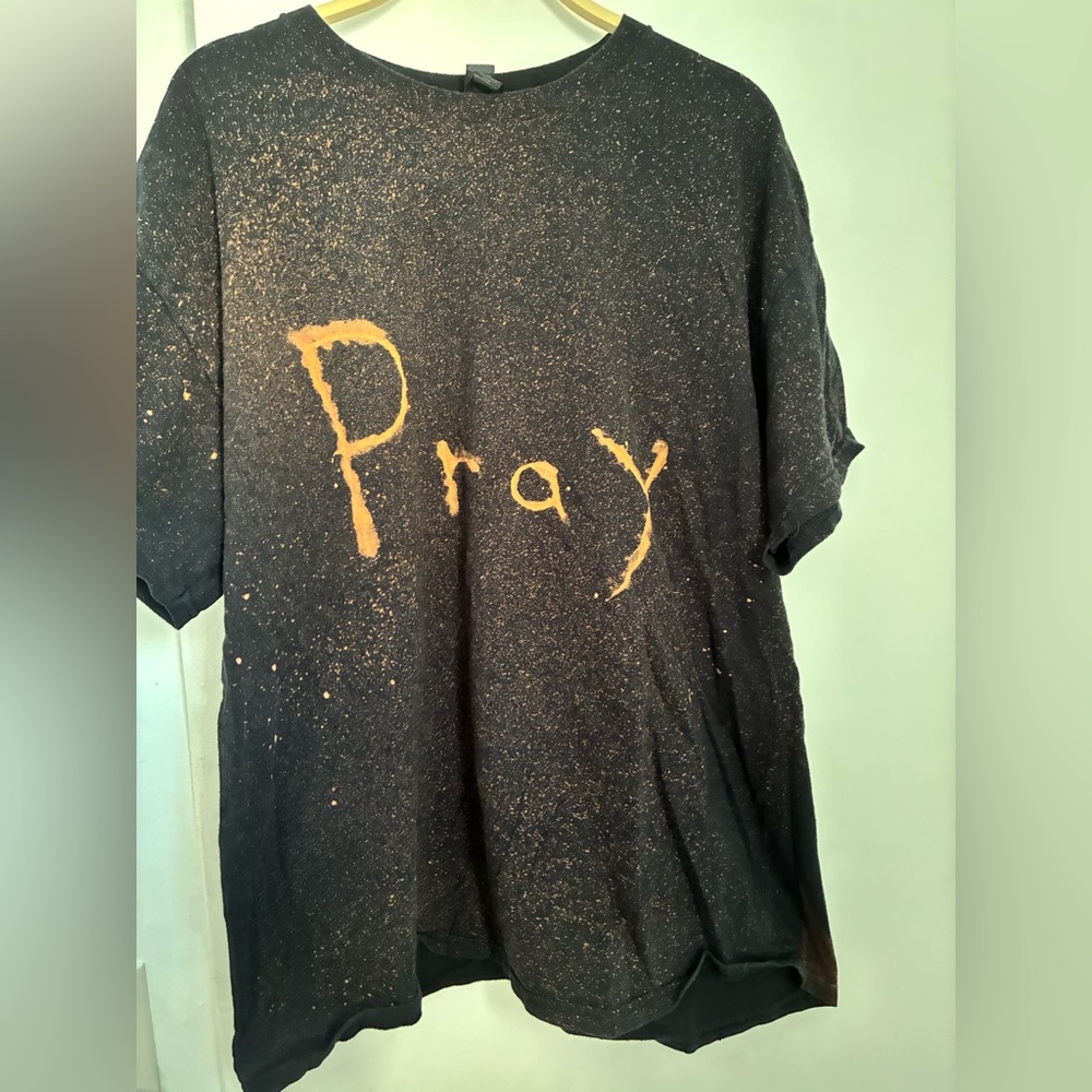 Black T-Shirt with Orange 'Pray' Design